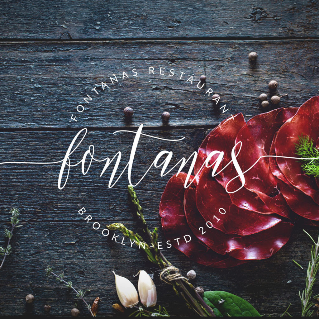 Cured meat slices, herbs, garlic, and olives on a dark wooden surface. Text reads, "Fontanas Restaurant Brooklyn ESTD 2010.